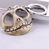 Koszmar przed świętami brodawkową Jack Skellington Key Ring wieszak maska ​​głowa lśniona w ciemnej figurze