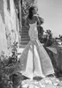 2020 Lyxiga Mermaid Bröllopsklänningar Sweetheart Lace Appliqued Beaded Ruffles Robes de Mariée Sirène Custom Made Country Bridal Gowns