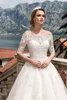 Nowe suknie ślubne z odłączonymi w połowie długich rękawów koronkowe zastosowane sukienki ślubne gorset