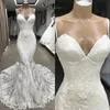 Abiti da sposa a sirena da spiaggia con scollo a cuore Appliques in pizzo Cinturino per spaghetti Abiti da sposa di moda semplice Tulle Sweep Train Abiti da sposa formali