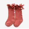 2019 Neue Kinder Socken Kleinkinder Girls Big Bogen gestrickt Knie hohe lange weiche Baumwoll -Spitzensocken Baby Rüschensocken C61154276266