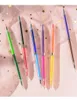 Hot Selling Tranperant Plastic Hand Account Barn Graffiti Dubbelsidig Dubbelfärger Glitter Gel Pen 12 Färger Gelmarkör Set Färgad penna