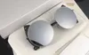 148 Новые специально солнцезащитные очки с ультрафиолетовой защитой для женщин Винтажная модель круглой металлической рамы с заклинателями популярного высшего качества.