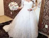 Magnifique robes de mariée en dentelle transparente creux arrière à manches longues une ligne prres des robes nuptiales royales balayent les vestidos de sentier de noiv4130292