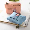 Cartoon swing meisje canvas mini portemonnee munten portemonnee sleutels clutch bags voor vrouwen