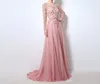 Pink Long Bridal Prom Dresses Illusion Jewel Neck Pearls Sash A-Line Golvlängd Tulle Celebrity Party Glänningar Major Beading aftonklänningar