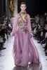 Elie Saab 2019 فساتين سهرة أرجوانية A Line مطرزة بالخرز برقبة عالية فساتين حفلات سويب تراين كم طويل