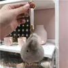 Carino vera pelliccia di coniglio coniglietto borsa fascino portachiavi accessori telefono borsa borsa regalo