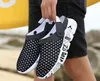 Gran oferta-Zapatos de jardín informales de verano para hombre, zuecos de malla transpirable, chanclas de playa, cómodas sandalias negras deslizantes para hombre