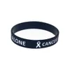 100PCS Nessuno combatte da solo Consapevolezza del cancro Bracciale in gomma siliconica Logo riempito di inchiostro Nero Taglia per adulti