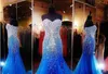 Królewskie niebieskie seksowne eleganckie sukienki na bal.