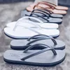 Hot Sale-New Mäns Sommar Solid Färg Enkel Flip Flops Mode Wear Män och Kvinnor Strandskor Par Tofflor Pinch Sandals