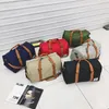 Designer- Uomo donna Borsa da viaggio nera Borsa a tracolla in tela di alta qualità Borsa da donna Borsa da fine settimana portatile Borsone impermeabile Lavaggio