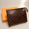 Bolsa de aseo 26 19 15 cm diseñador moda marrón embrague cosmético bolso de belleza bolso de viaje de lujo Mini Pochette Accesorios Monogramado lienzo