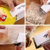 Ny Mini Handle Bag Sealer Elektronisk Hem Värmeförseglingsmaskin Vakuum Impuls Sealer Seal Packing Plast Bag Clips Köksredskap