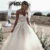 A Line Beach Wedding Dresses Strapless Beads Appliques Tulle Wedding Dresses Sweep Train Boho Bridal Gowns