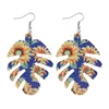 Neue Mode PU Leder Ohrringe für Frauen Boho Sonnenblume Gänseblümchen Druck Fisch Knochen Doppel Seite Baumeln Ohrringe Partei Schmuck Christ4359224