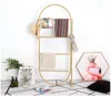 Golden clothing display rack against wall Children Furniture Simple floor-mounted hat shelf creative decorative scarf racks