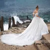 Sexig Sweetheart Cap Sleeve Cathedral Tåg Baklösa Bröllopsklänningar 2020 Lace Up Beach Bride Dress Appliques Bröllopsklänningar