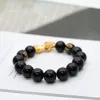 Imitatie zwarte agaat kralen strengen voor vrouwen en mannen armband goud mythisch wild dier boeddhisme 20pcs / lot