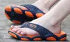 Tofflor Mäns Massage Sole Flip Flops Anti Skid Beach Skor på sommar och män Sandaler inomhus Badrum Online Shopping Stores till salu