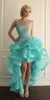 Jewel Sheer Neckline High Low Short Homecoming Dresses Turquoise Prom Gowns With Lace Applique Backless Ruffles Cocktail Gowns Cus311U