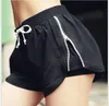 Running shorts met voering anti-light training vrouwen sneldrogend side rits fitness yoga shorts