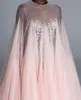 Stunning Sequined Prom Dresses Sheer Jewel Neck A Line Short Evening Gowns Covered Buttons Knee Length Tulle Pleated Formal Dress248M