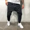 2019 Abbigliamento da uomo Pantaloni Harem neri Pantaloni da uomo tascabili Pantaloni da uomo Pantaloni sportivi hip-hop causali Tuta kargo pantolon