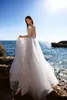 Sheer Bateau Beach Suknie ślubne Koronkowe Aplikacje Bohemia Suknie ślubne z Tassel Criss Cross Back Plus Size Wedding Sukienka