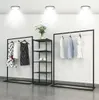 La fenêtre de magasin de supports d'atterrissage de meubles commerciaux de support d'exposition de magasin d'habillement des femmes est étagère en tissu suspendue