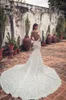 2020 Mermaid Bröllopsklänningar Sheer Off Shoulder Lace Appliqued Bridal Gowns Court Train Plus Storlek Tulle Beach Bröllopsklänning