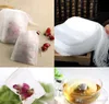 حار جديد 100 قطعة / الحزمة teaBags 5.5 × 7 سنتيمتر فارغة عطر أكياس الشاي مع سلسلة شفاء ختم ختم ورقة فلتر ل عشب الشاي فضفاض bolsas WCW220