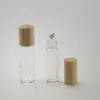 10ml 15ml Clear Glass Bottle Roll On Tom Fragrance Parfym Essential Oljeflaskor med Metal Ball Roller Bamboo Cap F2936
