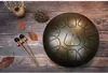 12 tum 11 anteckningar Percussion Drums Steel Tongue Drum Hand Pan Drum med trumman