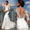 Sheer Jewel Neck Demi-manches Robes de mariée Illusion Back avec boutons Long Fit and Flare Robes de mariée