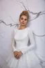 A Bohemian Beach Line Dresses Jewel Neck Long Sleeves Lace Satin Tiersed Tulle Backless Sweep Train Wedding Dress Bridal Gowns