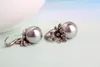 Orecchini a bottone per le donne Temperamento Orecchino di perle Gioielli in argento Fiore del sole Femme Earing Orecchini Bijoux