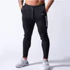 Svart joggare byxor män sweatpants bomull spårpants casual skinny byxor manlig gym fitness träning höst springa sportkläder
