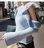 Ny design kvinnor vår o-hals långärmad ruffles lapptäcke av axel ihålig utgrå blå färg stickade tröja topphoppare