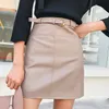 JUIRTS Femmes Bureau à taille haute Petite Jupe courte femelle avec ceinture Winter beige Beige noir A-Line Cuir PU pour