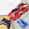 Electric/RC Car EMT ST3 Infrared Remote Control Wall Climbing Stunt Car Toy Electric Suction Climb Glass 360 Rotate LED Lights Christmas Kid Gift 2-2 240314