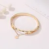 L’Europe et l’Amérique aiment le bracelet romain numérique gland pêche tempérament coeur sauvage bracelet coréen sauvage bijoux de mode en gros