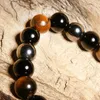 10mm Tiger Eye Hämatitperlen Armbänder Klassiker Lucky Stone Perlen Elastic Seilarmbänder für Frauenmänner3710532