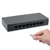 Freeshipping Mini 8 Port 10/100 Mbps Ağ Anahtarı HUB Hızlı LAN Ethernet Ağ Masaüstü Anahtarları Adaptörü Siyah / Beyaz