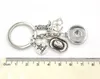 Nyankomst Partihandel 18mm Snap Smycken Cowboy Nyckelring Handväska Charm Western Cowboys Hatt Stövlar Snap Keychain Nyckelring Presenter för män kvinnor