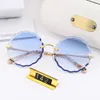 Luxury 142 Sunglass For Women Fashion Deisng CE142 Round Frameless UV400 Len Summer Style Adumbral Butterfly Designer Face Come Wi4815164