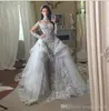 Vestidos de novia con cuentas de encaje de lujo 2019 Ilusión de cuello alto Vestidos de novia de manga larga Faldas con gradas Vestidos de boda con espalda transparente saudita