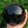 2020 1pcs Natural heavy Natural Black Obsidian Sphere Large Crystal Ball Healing Stone Foe Home Decoration317i