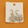 Boucles d'oreilles pour femmes en strass plaqué or blanc Japon et Corée du Sud Boucles d'oreilles en zircon de haute qualité avec boucle d'oreille hypoallergénique